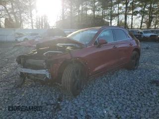 2022 Genesis GV70 Sport with VIN KMUMCDTC6NU022071, listed as a Copart auction lot 88874765 with 57,204 mi miles and Salvage title. Bid and sale history available at DreamBid. Image 1.