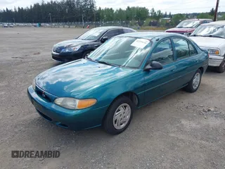 1998 Ford Escort LX with VIN 1FAFP10P9WW287021, listed as a IAAI auction lot 42259930 with 145,042 mi miles and . Bid and sale history available at DreamBid. Image 2.