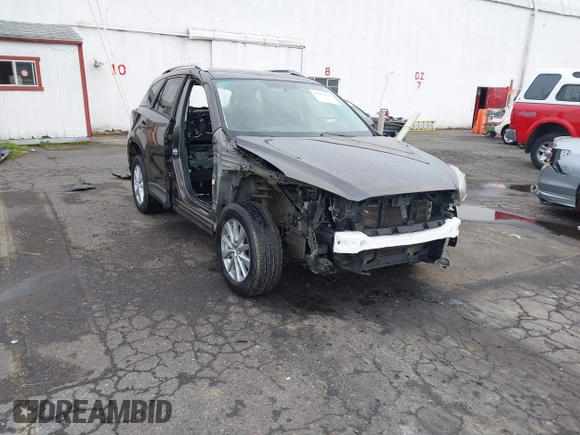 2016 Mazda CX-5 Touring with VIN JM3KE4CY5G0695242, listed as a IAAI auction lot 41795135 with 195,162 mi miles. Bid and sale history available at carsss.com. Image 1.