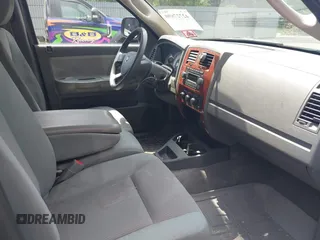 2005 Dodge Dakota SLT with VIN 1D7HW42N25S155393, listed as a IAAI auction lot 42727690 with 230,042 mi miles and . Bid and sale history available at DreamBid. Image 5.