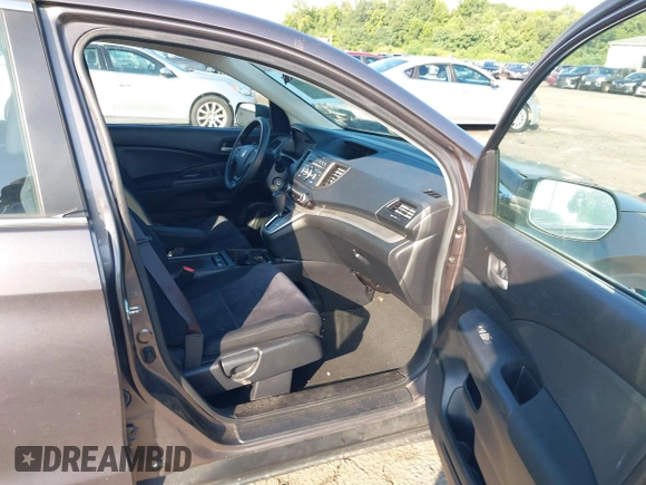 2013 Honda CR-V LX with VIN 3CZRM3H31DG703436, listed as a IAAI auction lot 42702584 with 140,013 mi miles and . Bid and sale history available at DreamBid. Image 5.