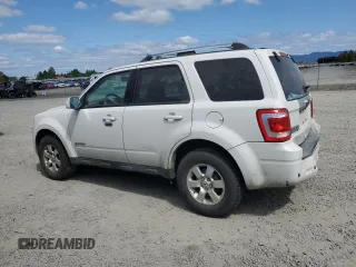 2010 Ford Escape Hybrid z VIN 1FMCU5K30AKC45288, wystawiony jako Copart lot #53479505 z przebiegiem 111 458 mil mil oraz Szkoda całkowita • Salvage title. Historia ofert i sprzedaży dostępna na DreamBid. Obrazek 2.