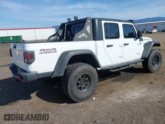 2021 Jeep Gladiator Mojave с VIN 1C6JJTEG2ML578573, выставлен на аукционе IAAI как лот 42034265 с пробегом 30 141 миль миль и . История ставок и продаж доступна на DreamBid. Изображение 4.