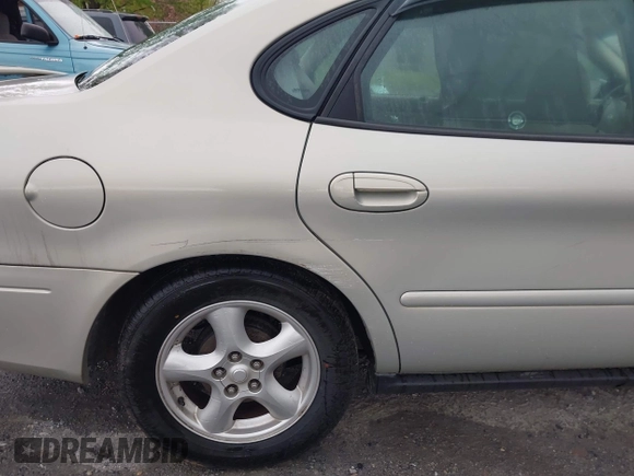 2003 Ford Taurus SES Standard with VIN 1FAFP55U43A140202, listed as a IAAI auction lot 41994960 with 90,650 mi miles. Bid and sale history available at carsss.com. Image 14.