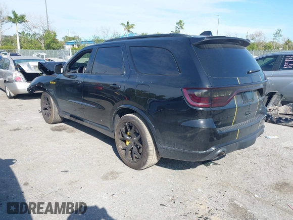 2024 Dodge Durango SRT 392 Premium with VIN 1C4SDJGJ6RC221616, listed as a IAAI auction lot 41280570 with 2,169 mi miles and . Bid and sale history available at DreamBid. Image 3.