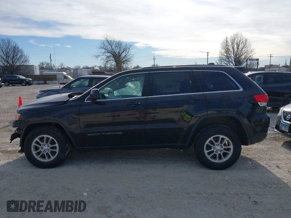2018 Jeep Grand Cherokee Laredo E with VIN 1C4RJFAG7JC244103, listed as a IAAI auction lot 41260642 with 116,797 mi miles. Bid and sale history available at carsss.com. Image 14.