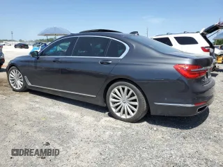 2017 BMW 7 Series 740i z VIN WBA7E2C30HG741105, wystawiony jako Copart lot #56632005 z przebiegiem 95 162 mil mil oraz Czysty tytuł • Clean title. Historia ofert i sprzedaży dostępna na DreamBid. Obrazek 2.