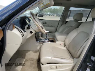 2011 Infiniti QX56 7-passenger with VIN JN8AZ2NE9B9005601, listed as a Copart auction lot 57013744 with 223,590 mi miles and Clean Title. Bid and sale history available at carsss.com. Image 7.