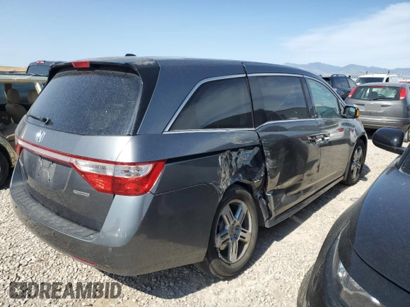 2012 Honda Odyssey Touring с VIN 5FNRL5H95CB120347, выставлен на аукционе Copart как лот 59111775 с пробегом 208 419 миль миль и Списание • Salvage title. История ставок и продаж доступна на DreamBid. Изображение 3.
