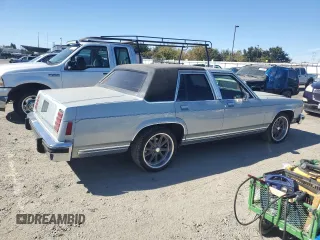 1987 Ford Crown Victoria z VIN 2FABP74F5HX169963, wystawiony jako Copart lot #75491944 z przebiegiem 89 729 mil mil oraz Szkody całkowita. Historia ofert i sprzedaży dostępna na DreamBid. Obrazek 3.