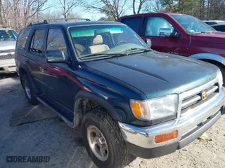 1997 Toyota 4Runner SR5 with VIN JT3GN86RXV0021552, listed as a IAAI auction lot 41493321 with 220,487 mi miles. Bid and sale history available at carsss.com. Image 1.