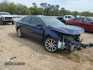 2013 Toyota Avalon XLE with VIN 4T1BK1EB3DU059217, listed as a Copart auction lot 50140735 with 94,357 mi miles and Salvage Title. Bid and sale history available at DreamBid. Image 4.