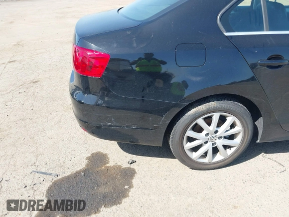 2014 Volkswagen Jetta Sedan SE w/Connectivity/Sunroof PZEV with VIN 3VWD17AJ8EM434456, listed as a IAAI auction lot 42099297 with 92,773 mi miles. Bid and sale history available at carsss.com. Image 12.