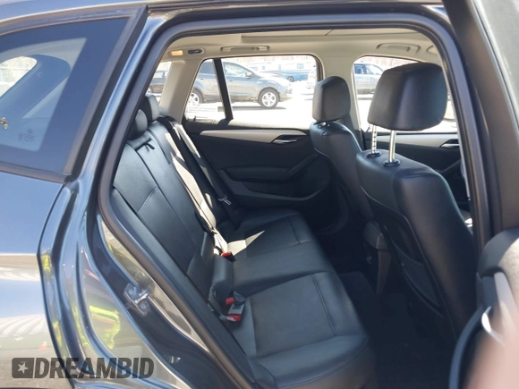 2015 BMW X1 xDrive28i with VIN WBAVL1C59FVY25442, listed as a IAAI auction lot 41854794 with 98,432 mi miles. Bid and sale history available at carsss.com. Image 8.