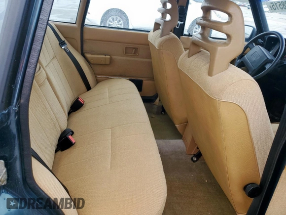 1992 Volvo 240 z VIN YV1AS8805N1467833, wystawiony jako Copart lot #51828515 z przebiegiem 178 826 mil mil oraz Szkoda całkowita • Salvage title. Historia ofert i sprzedaży dostępna na DreamBid. Obrazek 10.