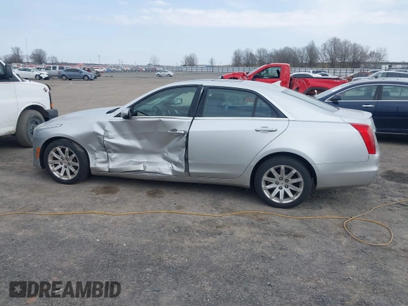 2014 Cadillac CTS Luxury AWD z VIN 1G6AX5SX2E0196881, wystawiony jako IAAI lot #41707633 z przebiegiem 169 168 mil mil oraz . Historia ofert i sprzedaży dostępna na DreamBid. Obrazek 14.