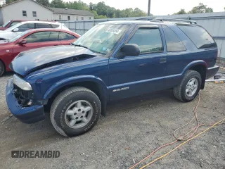 2000 Chevrolet Blazer LS z VIN 1GNCT18W3YK104430, wystawiony jako Copart lot #68858864 z przebiegiem 47 342 mil mil oraz Szkoda całkowita • Salvage title. Historia ofert i sprzedaży dostępna na DreamBid. Obrazek 1.