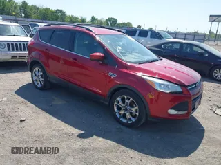 2015 Ford Escape SE with VIN 1FMCU0GXXFUA57386, listed as a IAAI auction lot 42043058 with 107,635 mi miles. Bid and sale history available at carsss.com. Image 1.