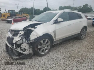 2012 Cadillac SRX Performance Collection z VIN 3GYFNBE32CS615988, wystawiony jako Copart lot #61198415 z przebiegiem 156 135 mil mil oraz Szkoda całkowita • Salvage title. Historia ofert i sprzedaży dostępna na DreamBid. Obrazek 1.