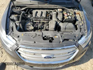 2015 Ford Taurus SE with VIN 1FAHP2D86FG184747, listed as a Copart auction lot 77659254 with 140,404 mi miles and Clean Title. Bid and sale history available at carsss.com. Image 11.