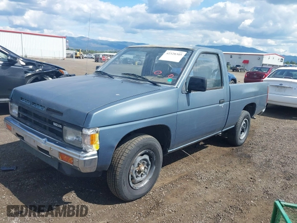1989 Nissan Hardbody z VIN 1N6ND11S7KC338798, wystawiony jako IAAI lot #42328305 z przebiegiem 153 347 mil mil oraz . Historia ofert i sprzedaży dostępna na DreamBid. Obrazek 2.
