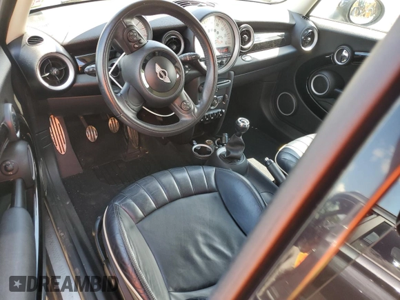 2012 MINI Hardtop S with VIN WMWSV3C57CTY25293, listed as a Copart auction lot 58053375 with 96,724 mi miles and Salvage title. Bid and sale history available at DreamBid. Image 8.
