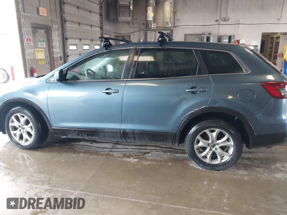 2014 Mazda CX-9 Touring with VIN JM3TB3CA0E0447066, listed as a IAAI auction lot 42350587 with 162,707 mi miles and . Bid and sale history available at DreamBid. Image 14.