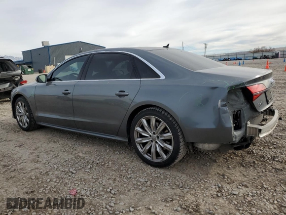2017 Audi A8 with VIN WAU44AFD3HN002052, listed as a Copart auction lot 41834475 with 111,666 mi miles and Salvage title. Bid and sale history available at DreamBid. Image 2.
