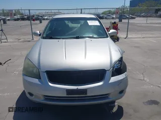 2006 Nissan Altima S with VIN 1N4AL11D56N405498, listed as a IAAI auction lot 42082567 with 228,463 mi miles and . Bid and sale history available at DreamBid. Image 12.