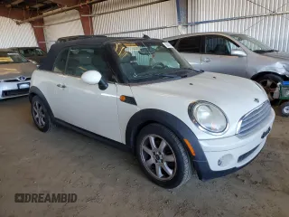 2010 MINI Convertible with VIN WMWMR3C59ATU98390, listed as a Copart auction lot 88820365 with 93,029 mi miles and Clean Title. Bid and sale history available at DreamBid. Image 4.