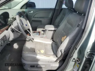 2007 Ford Five Hundred SEL z VIN 1FAHP24197G143131, wystawiony jako Copart lot #54249095 z przebiegiem 153 305 mil mil oraz Tytuł czysty. Historia ofert i sprzedaży dostępna na DreamBid. Obrazek 7.