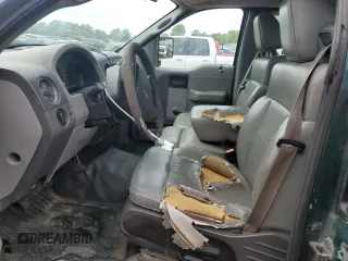 2007 Ford F-150 XL with VIN 1FTRF12W97KA93970, listed as a Copart auction lot 54404435 with 185,017 mi miles and Salvage title. Bid and sale history available at DreamBid. Image 7.