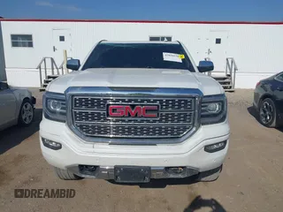 2017 GMC Sierra 1500 Denali z VIN 3GTU2PEC8HG502379, wystawiony jako IAAI lot #42040538 z przebiegiem 108 960 mil mil oraz . Historia ofert i sprzedaży dostępna na DreamBid. Obrazek 12.