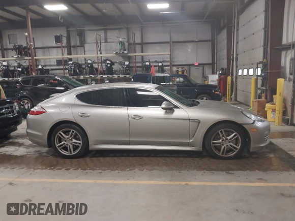 2012 Porsche Panamera S с VIN WP0AB2A71CL060068, выставлен на аукционе IAAI как лот 42309742 с пробегом 93 334 миль миль и . История ставок и продаж доступна на DreamBid. Изображение 13.