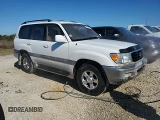 2001 Toyota Land Cruiser with VIN JTEHT05J912001418, listed as a Copart auction lot 81594494 with 289,258 mi miles and Salvage Title. Bid and sale history available at carsss.com. Image 4.