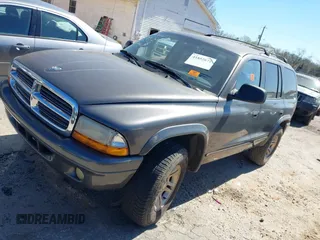 2003 Dodge Durango SLT with VIN 1D4HS48N43F566123, listed as a IAAI auction lot 41852672 with 268,376 mi miles and . Bid and sale history available at DreamBid. Image 2.