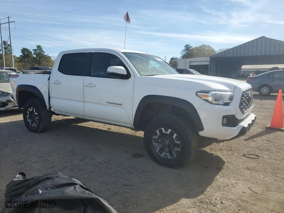 2021 Toyota Tacoma 4WD SR with VIN 5TFCZ5AN8MX260072, listed as a Copart auction lot 49597065 with 84,673 mi miles and Salvage Title. Bid and sale history available at carsss.com. Image 4.