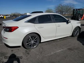 2023 Honda Civic Touring z VIN 2HGFE1F95PH314838, wystawiony jako Copart lot #52545085 z przebiegiem 29 863 mil mil oraz Szkoda całkowita • Salvage title. Historia ofert i sprzedaży dostępna na DreamBid. Obrazek 3.