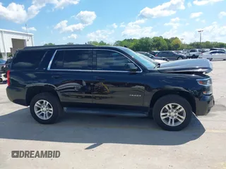 2019 Chevrolet Tahoe LT z VIN 1GNSKBKC1KR200476, wystawiony jako IAAI lot #41897702 z przebiegiem 136 432 mil mil oraz . Historia ofert i sprzedaży dostępna na DreamBid. Obrazek 13.