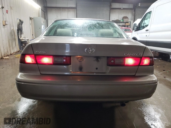 1999 Toyota Camry LE с VIN 4T1BG22K4XU469265, выставлен на аукционе Copart как лот 80112794 с пробегом 184 782 миль миль и Списание • Salvage title. История ставок и продаж доступна на DreamBid. Изображение 6.