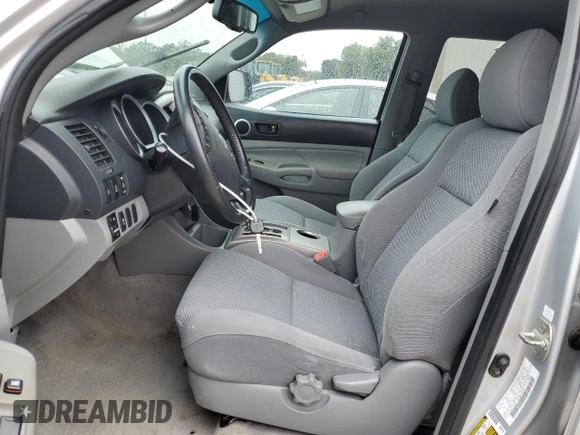 2011 Toyota Tacoma PreRunner with VIN 3TMJU4GN6BM123030, listed as a Copart auction lot 74906634 with 212,794 mi miles and Salvage Title. Bid and sale history available at DreamBid. Image 7.