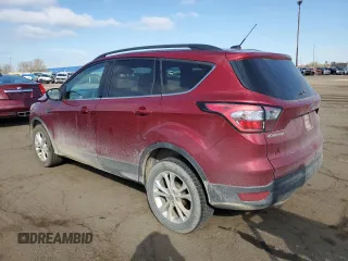 2018 Ford Escape SE z VIN 1FMCU9GD0JUC29279, wystawiony jako Copart lot #54511595 z przebiegiem 77 547 mil mil oraz Czysty tytuł • Clean title. Historia ofert i sprzedaży dostępna na DreamBid. Obrazek 2.