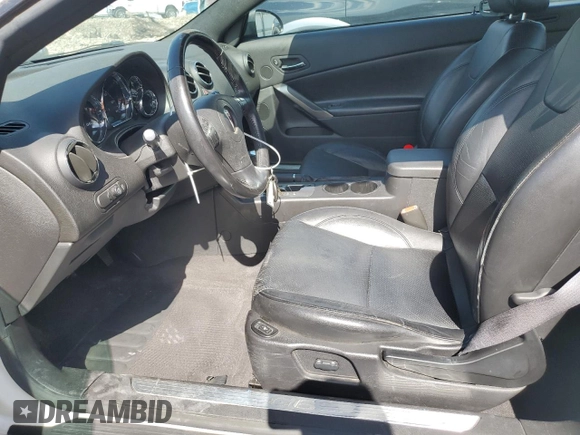 2006 Pontiac G6 GT with VIN 1G2ZH358664276821, listed as a Copart auction lot 52161295 with 68,030 mi miles and Salvage title. Bid and sale history available at DreamBid. Image 7.