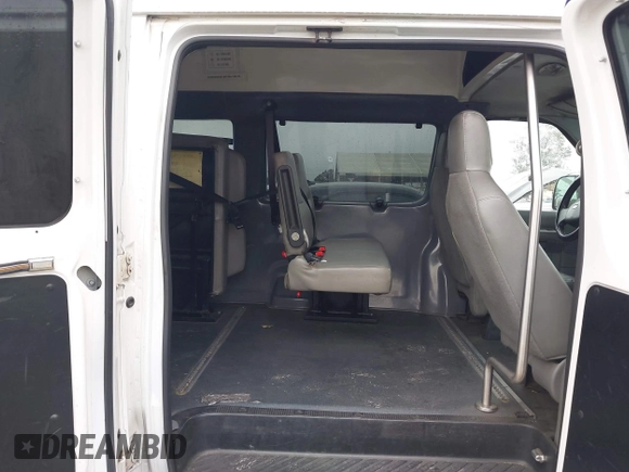 2009 Ford Econoline Cargo Commercial with VIN 1FTNE14W69DA00876, listed as a IAAI auction lot 41894062 with 400,622 mi miles and . Bid and sale history available at DreamBid. Image 8.