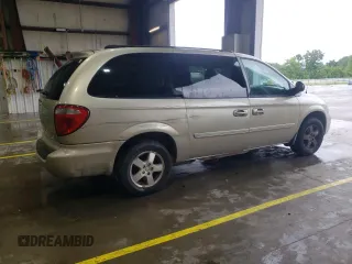 2005 Dodge Caravan SXT with VIN 2D4GP44L85R401401, listed as a Copart auction lot 58576535 with 190,858 mi miles and Salvage title. Bid and sale history available at DreamBid. Image 3.