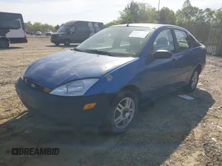 2002 Ford Focus SE with VIN 1FAFP34302W129809, listed as a IAAI auction lot 42083220 with 217,739 mi miles and . Bid and sale history available at carsss.com. Image 2.