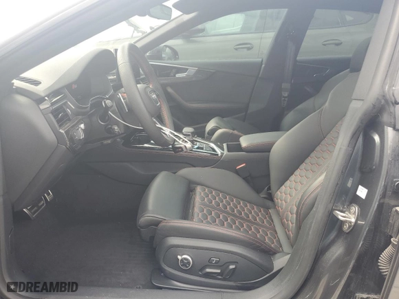 2024 Audi RS 5 Sportback with VIN WUAAWCF54RA900689, listed as a Copart auction lot 77674404 with 7,496 mi miles and Non Repairable. Bid and sale history available at carsss.com. Image 7.
