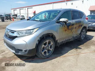 2018 Honda CR-V EX with VIN 7FARW2H59JE059539, listed as a IAAI auction lot 41895078 with 132,631 mi miles and . Bid and sale history available at DreamBid. Image 2.