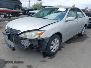 2004 Toyota Camry LE with VIN 4T1BE32K34U857725, listed as a IAAI auction lot 42131740 with 107,975 mi miles and . Bid and sale history available at DreamBid. Image 2.