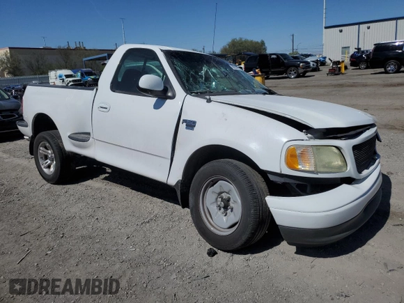2002 Ford F-150 XL with VIN 1FTRF07L62KD27855, listed as a Copart auction lot 60939935 with Not provided miles and Salvage title. Bid and sale history available at DreamBid. Image 4.